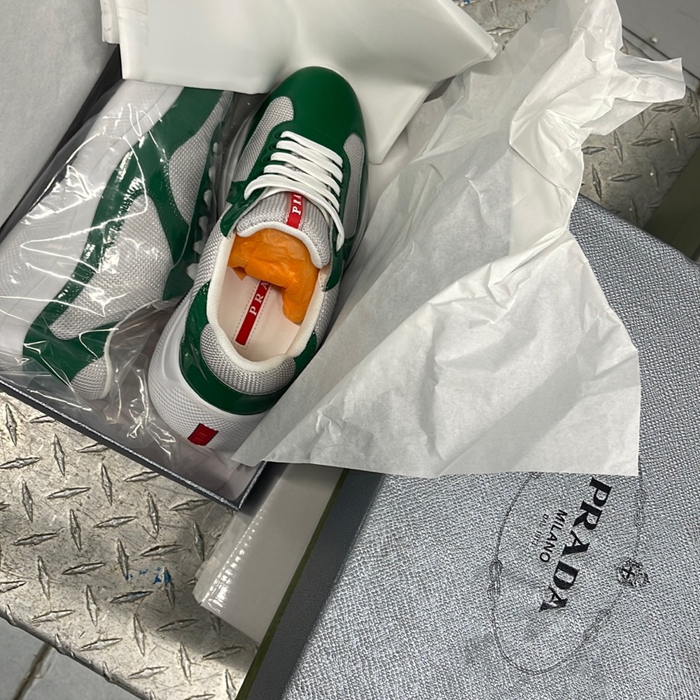 Green and white sneakers